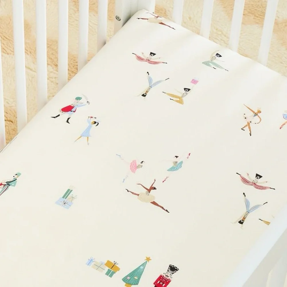 West Elm Nutcracker crib sheet collection baby girl boy Christmas ballet unisex